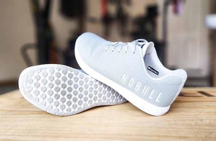 nobull-trainer-gray-gym-stacked-on-wooden-box